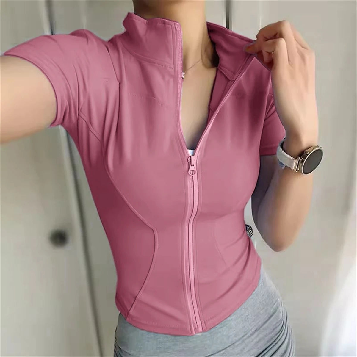 Top Deportivo con cremallera mujer